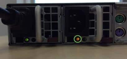 Amber-colored LED on USM appliance power supply.