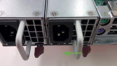 Red-colored lever that releases USM appliance power supply.